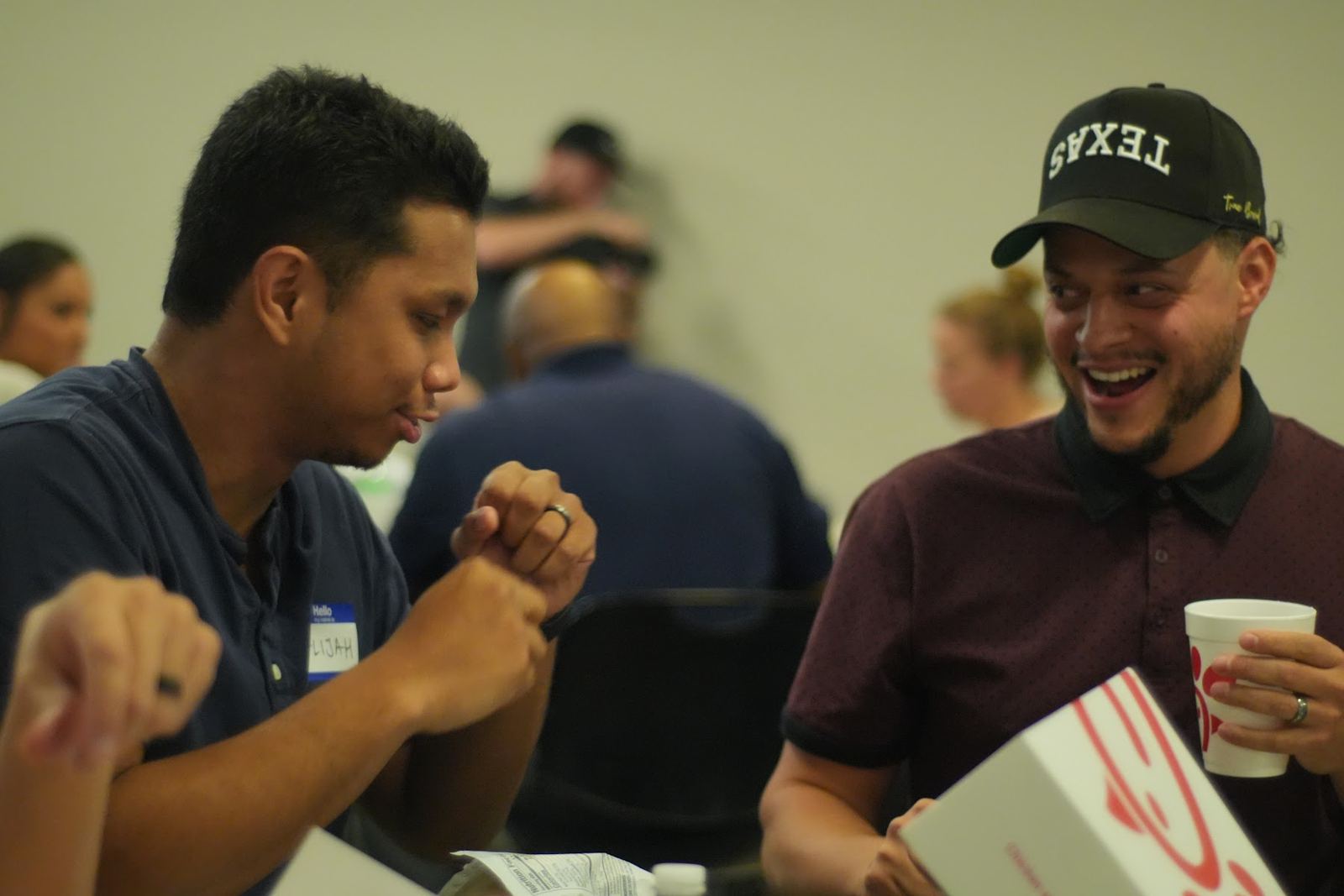 Pastors from partner churches laughing together at a Plant Dallas gathering